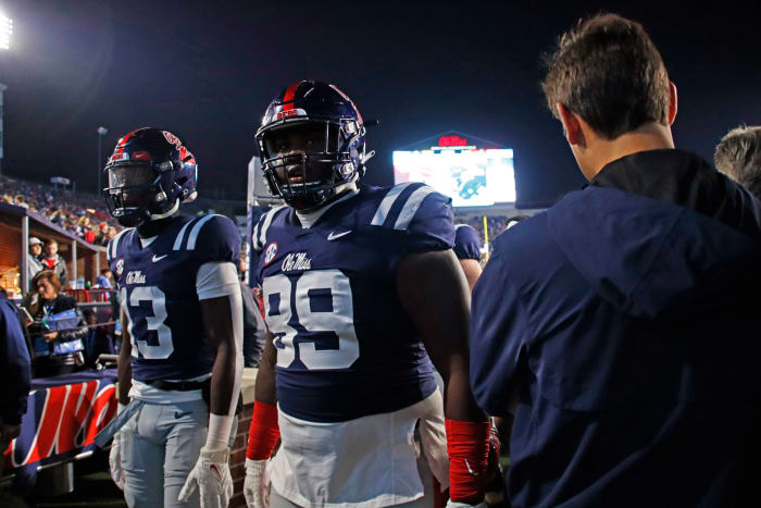 Ole Miss Rebels defensive lineman JJ Pegues exits the field after beating the Georgia Tech Yellow Jackets 48-23 in Week 3 (2023).